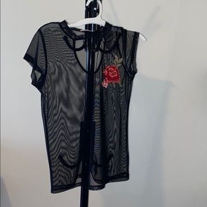 Transparent black shirt with floral decor